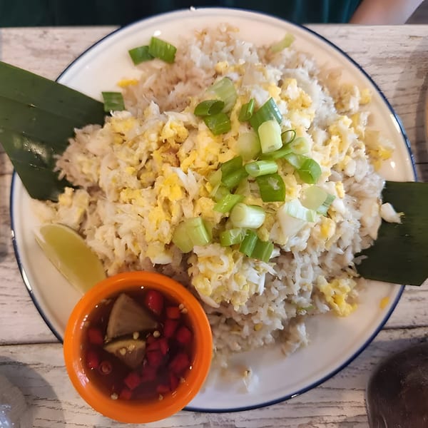 Zaab Zaab's Thai fried rice with scrambled egg, green onions, lime, and chili sauce.