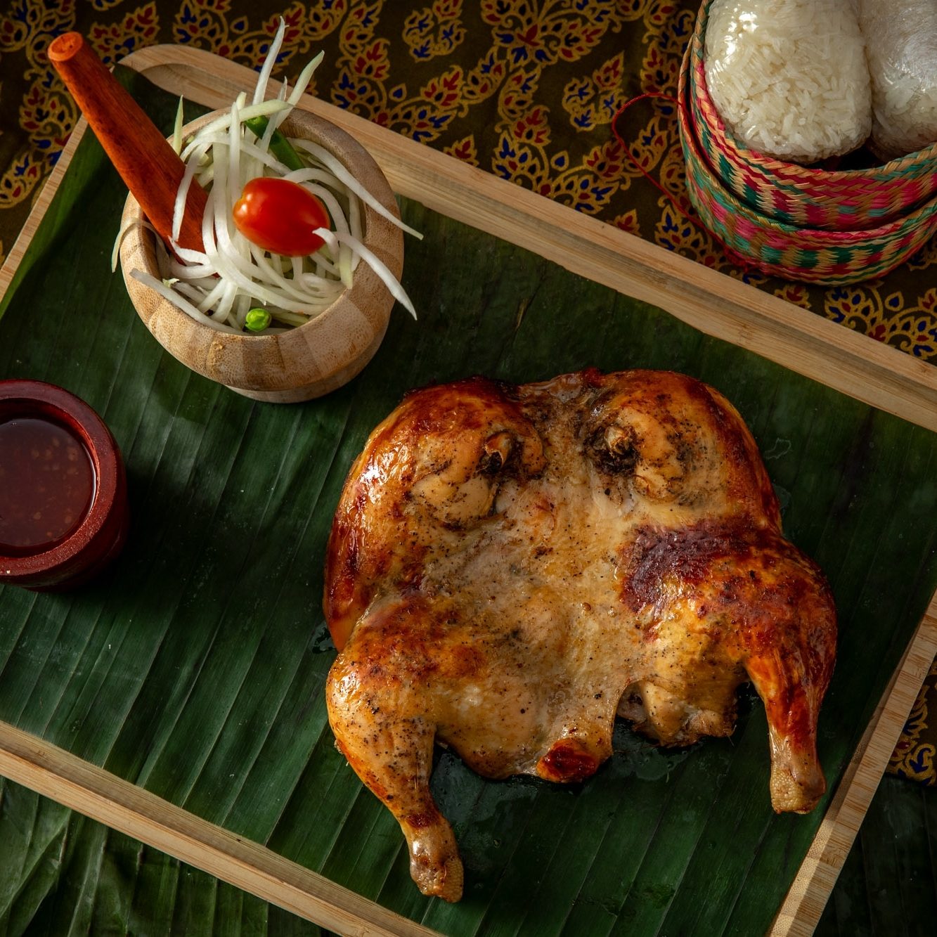 Gai Yang Vichean Buri (Half Chicken Combo with Somtum).