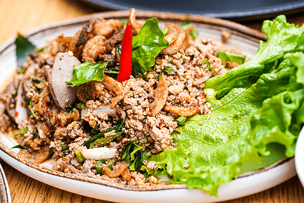 Spicy pork salad with herbs